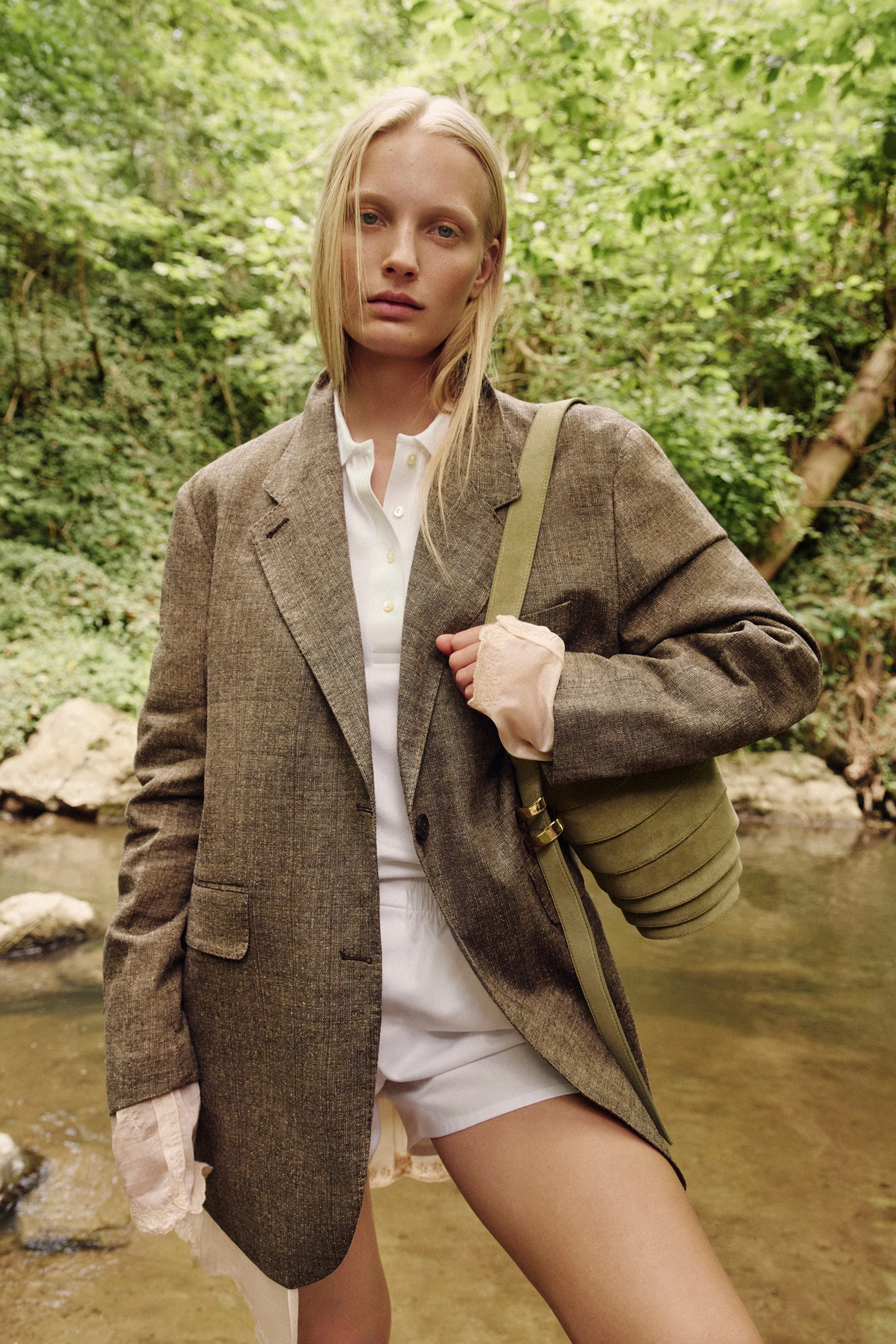 The Spiral Bag worn at a forest stream