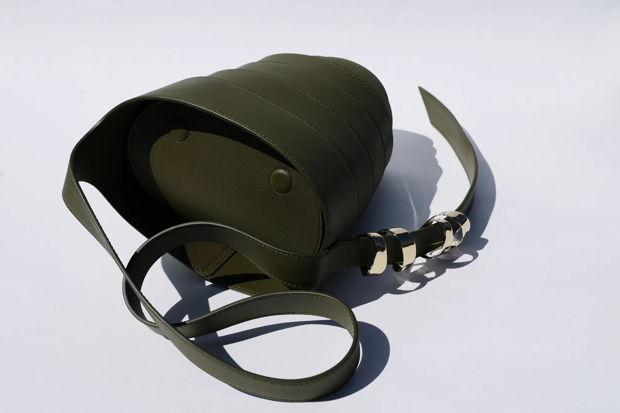 The Spiral Bag .0112 in olive, on its side