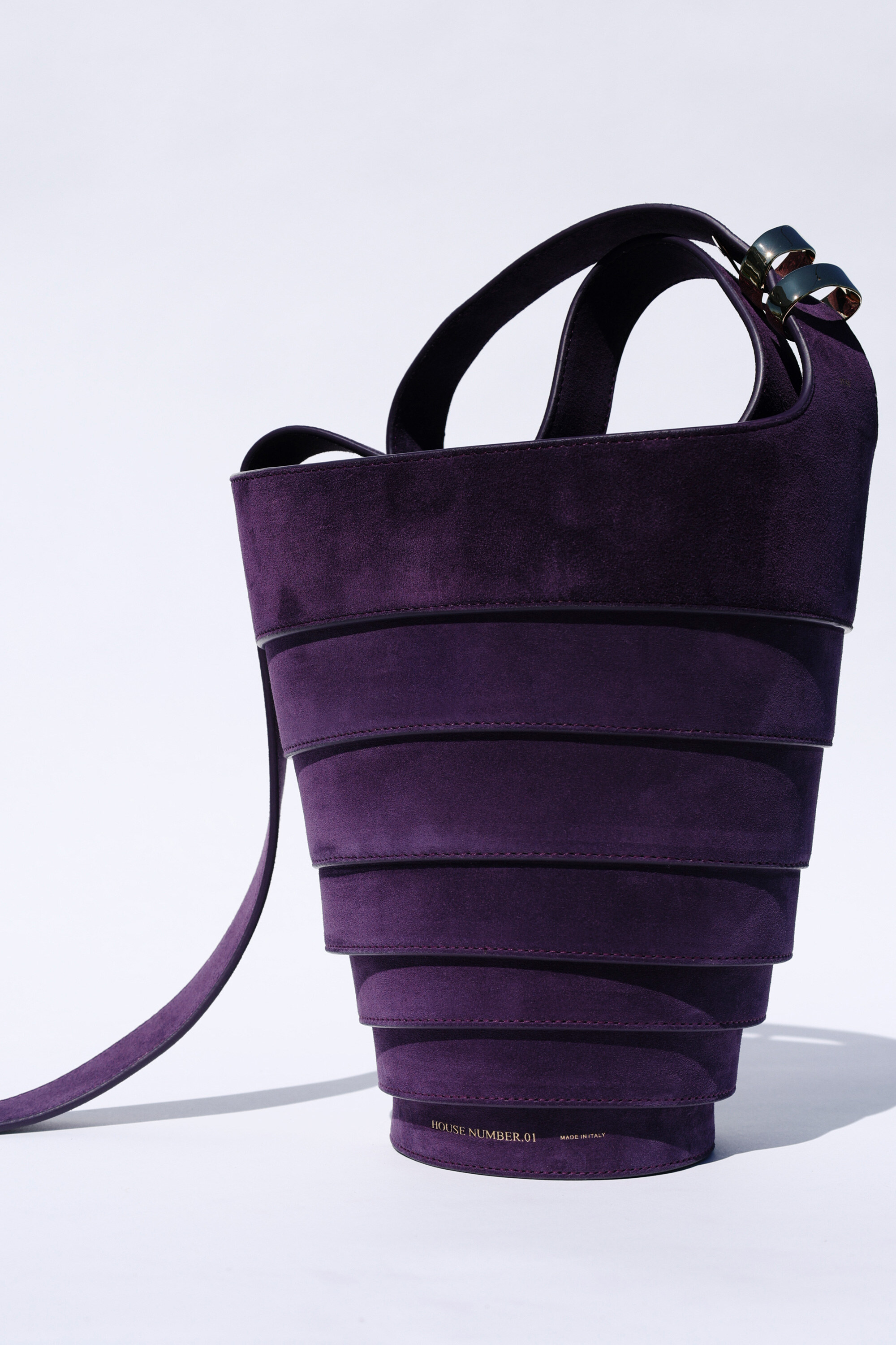 The Spiral Bag in purple suede